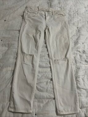 Women’s White Distressed Knee Jeans